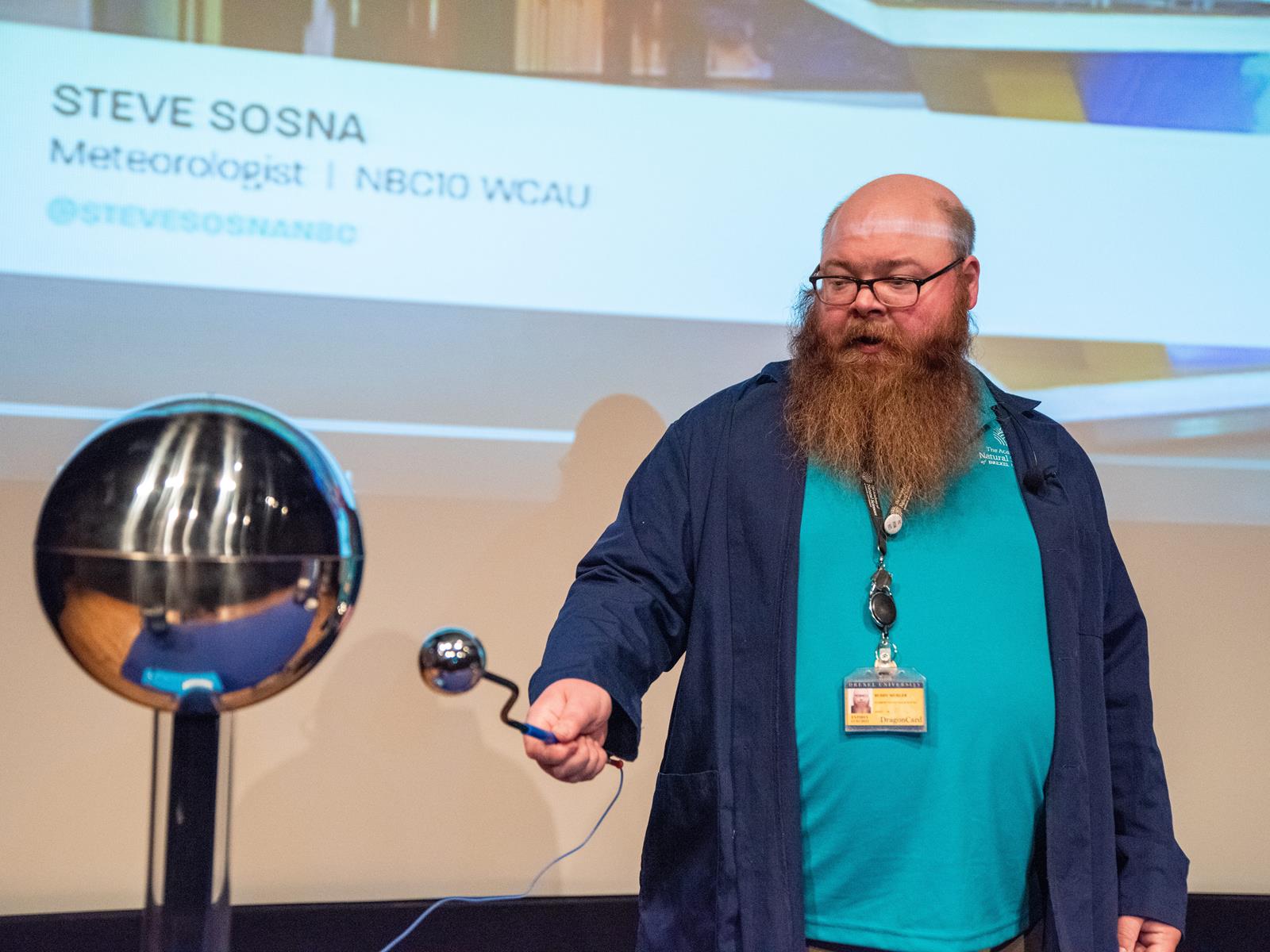 An academy educator conducting an experiment with lightning.
