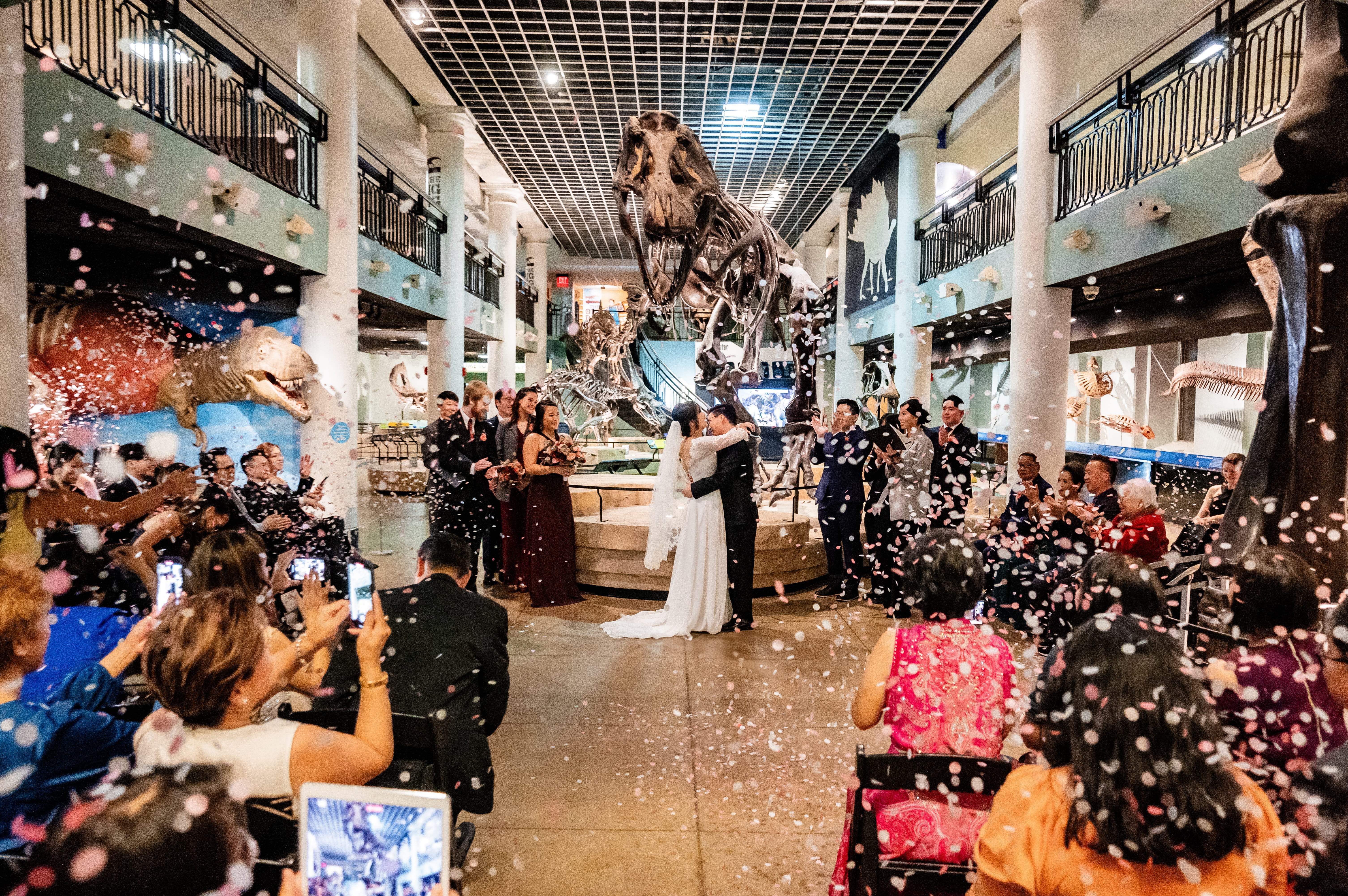 A wedding ceremony under the T-rex.