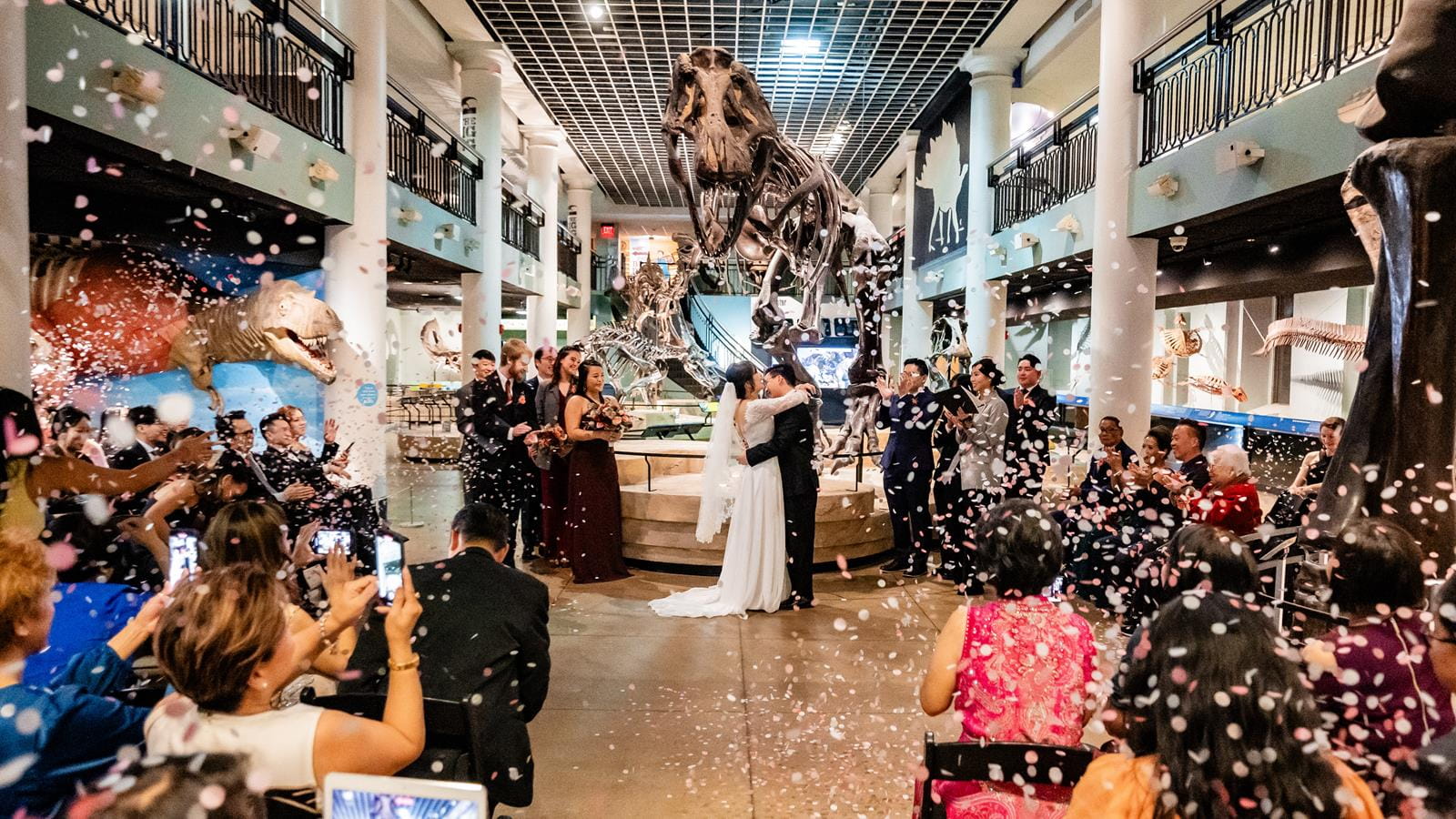 A wedding ceremony under the T-rex.