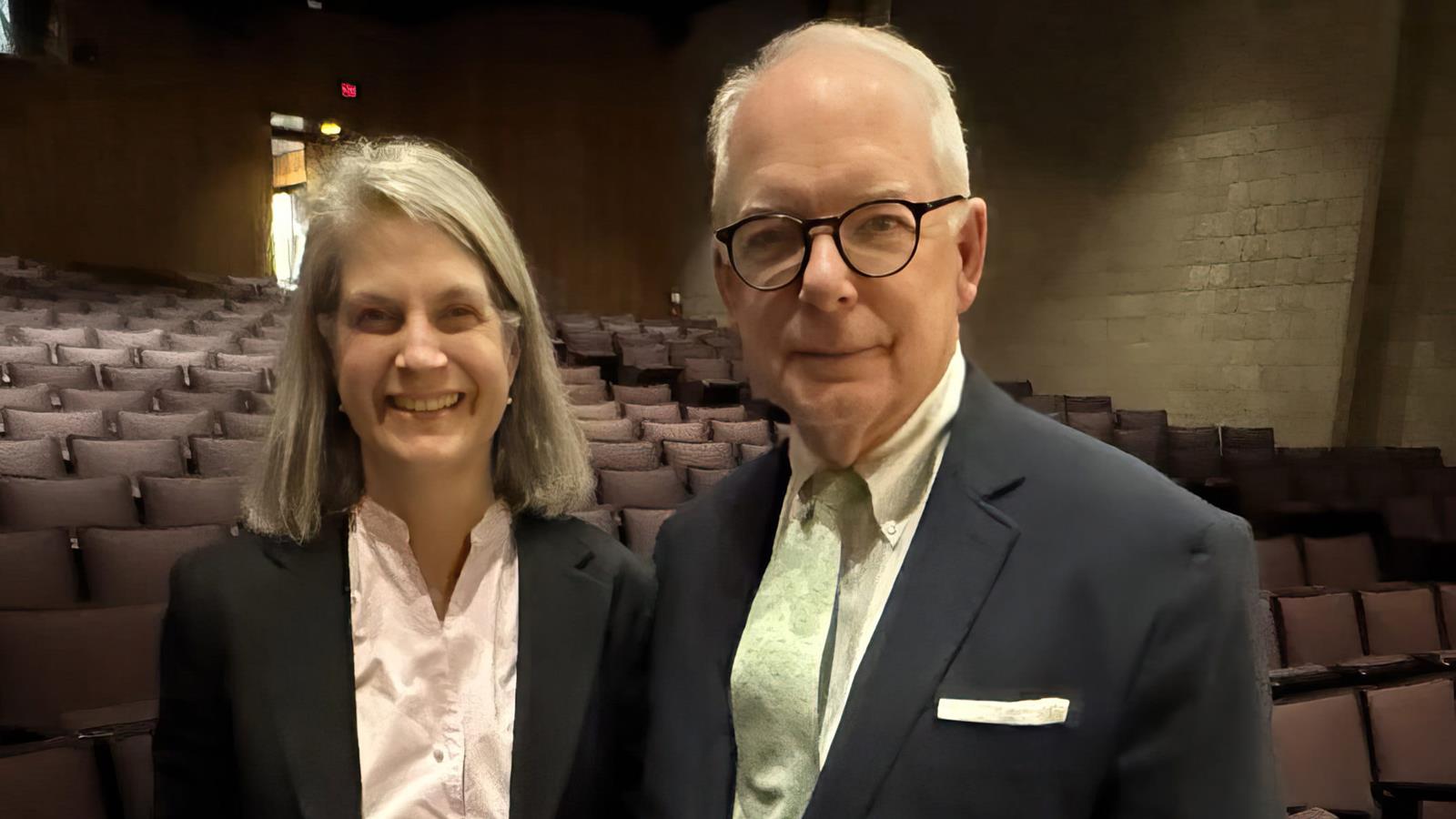 A photo of Suzanne Biemiller standing next to David E. Griffith.