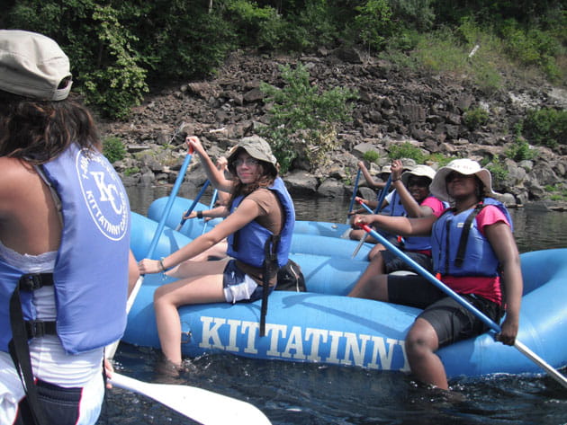 Young women rafting