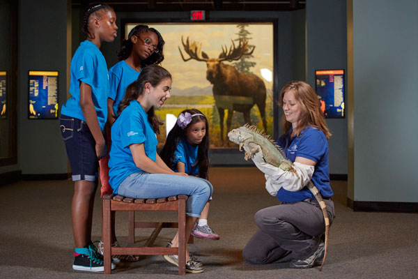 Educator with Iguana