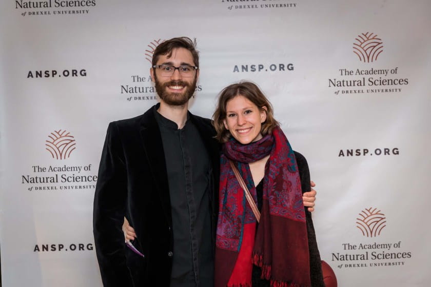 Young couple poses in front of ansp.org background