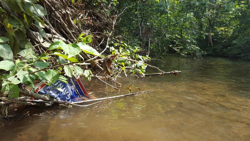 trash in stream