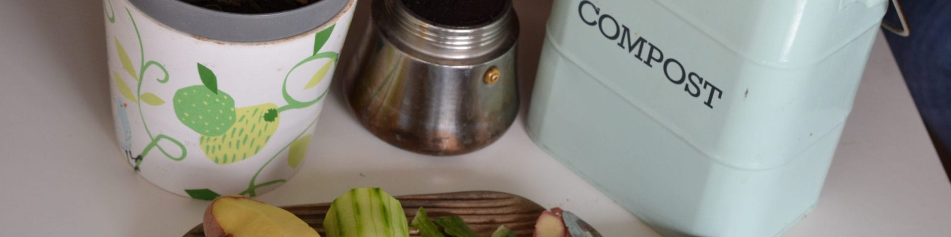 vegetable peels and compost bin