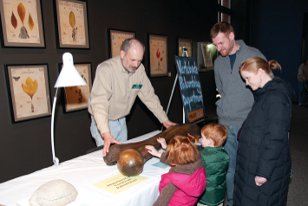 Ned Gilmore talks with visitors at Paleopalooza