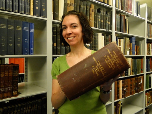 photo of librarian holding Cope's publication