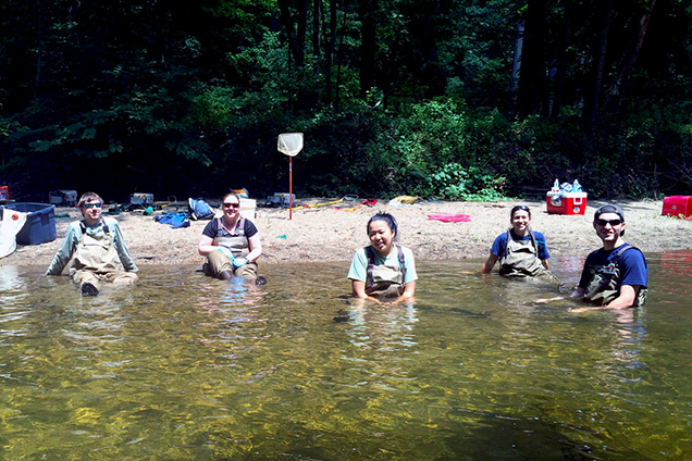 academy scientists in creek
