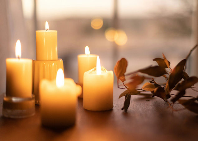 A group of candles on a table